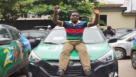 Airtel customer, Dr. Samuel Akpan, celebrating after winning the Hyundai SUV in Centenary promo.